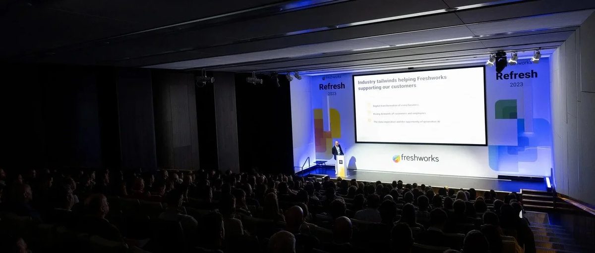 Speaker on stage at Freshworks Refresh in London